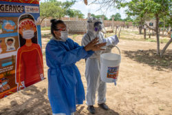 MI Americas team members, in partnership with USAID, training and sensitizing indigenous communities to WASH protocols throughout the Covid-19 pandemic. 
